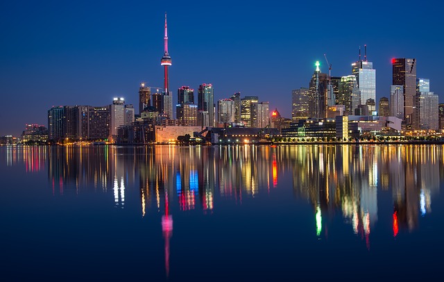 scene of Canadian city across the water at night